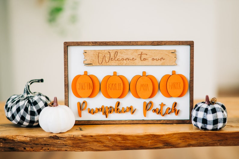 May include: Wooden sign with the text "Welcome to our Pumpkin Patch" and four orange pumpkin cutouts with the names Justin, Kaylee, Mya, and Walker.