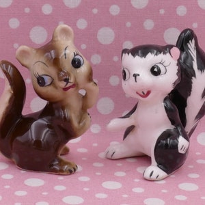 Pair of Ceramic Squirrel and Skunk Ornaments