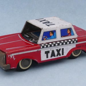 Vintage Tin Litho Tinplate Lithographed Friction Taxi Toy Car