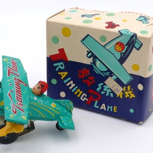 1960&#39;s Tin Litho Wind-up Clockwork &#39;Training Plane&#39; Mechanical Toy Original Box
