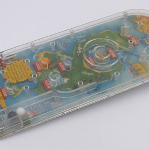 1950&#39;s Bagatelle Handheld Treasure Island Pinball Game MAR Toys United States