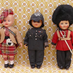 Vintage Sleepy Eye Folk Art Heritage Soldier Guard Dolls Traditional Uniforms