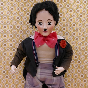 Mid-Century Charlie Chaplin Glazed Porcelain and Cloth Doll