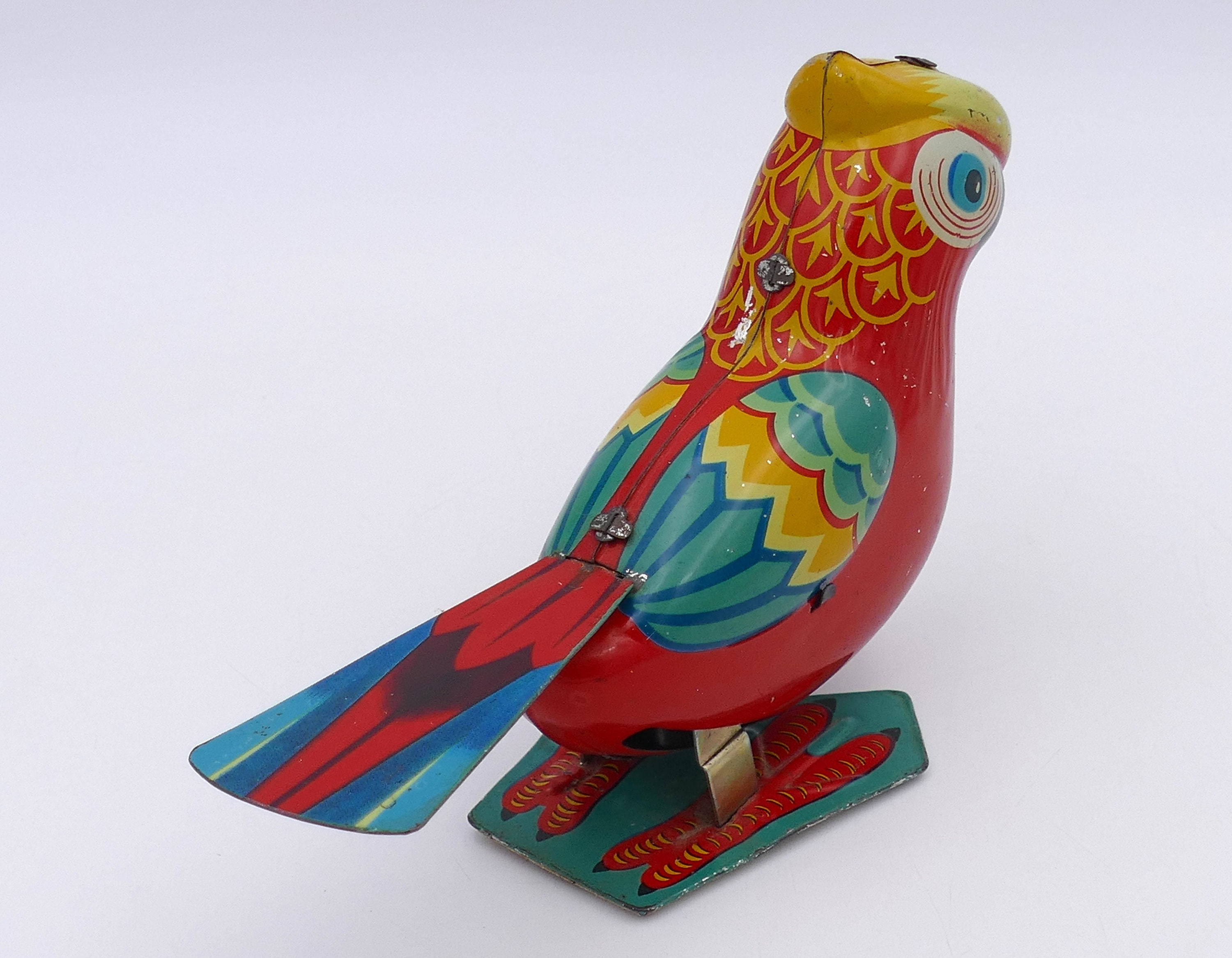 1960年代のブリキ製石版製ゼンマイ仕掛けのオウムの鳥のおもちゃ B
