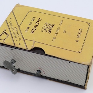 Vintage Mechanical Wind-up Yanoman Secret Coin Bank How To Get Wealthy Secret Diary A. Miser Money Box Savings Bank Penny Bank