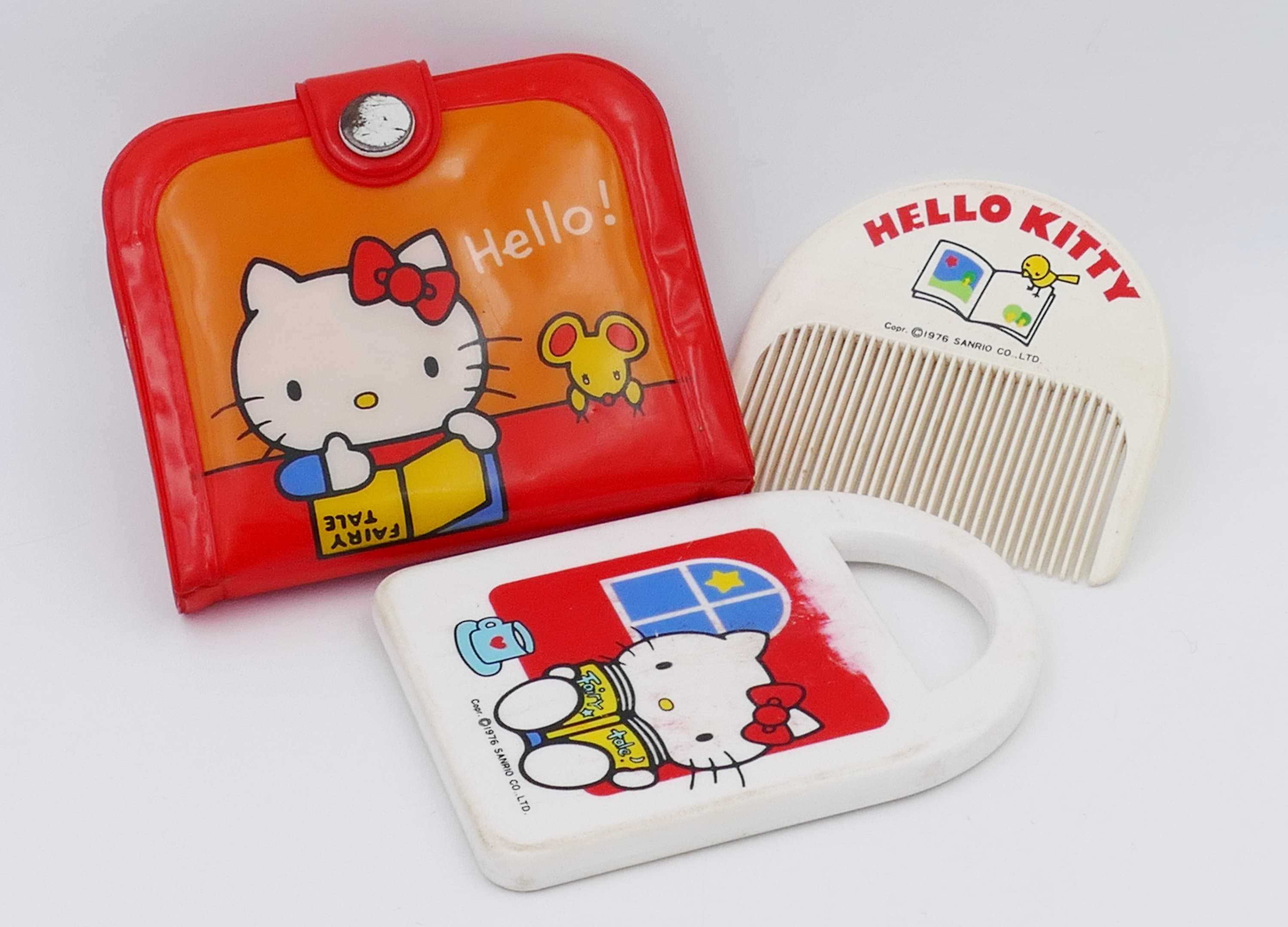 Happily giggling Hello kitty with a red bow, Japanese kawaii