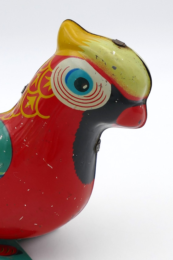 1960年代のブリキ製石版製ゼンマイ仕掛けのオウムの鳥のおもちゃ B