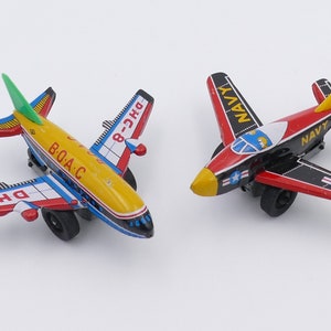 Pair Tin Litho Japan 1950&#39;s Friction Toy Airplanes