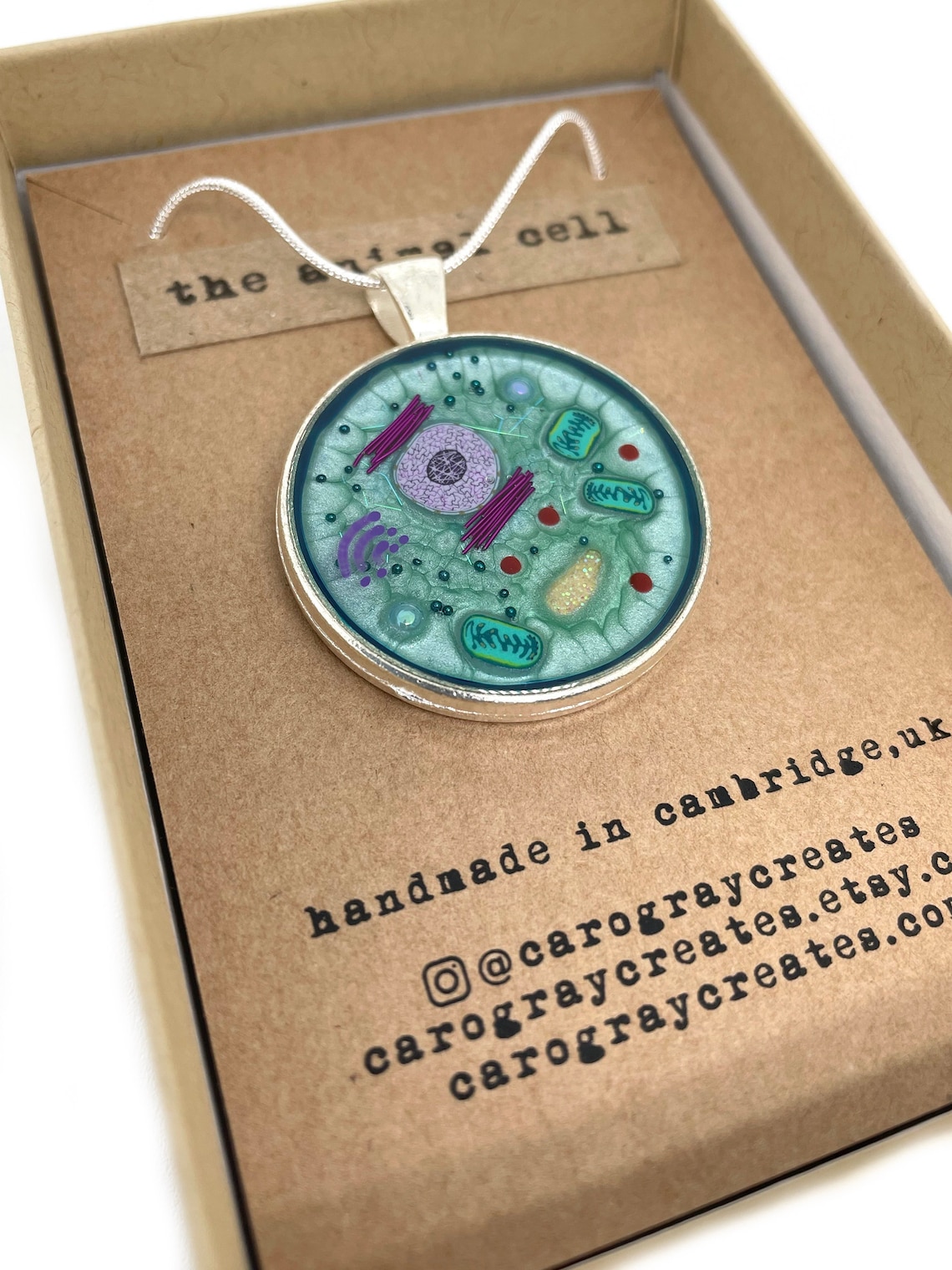 a necklace made from pretend animal cells