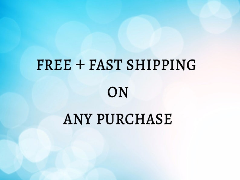 May include: A blue and white blurred background with the text "FREE + FAST SHIPPING ON ANY PURCHASE" in black.