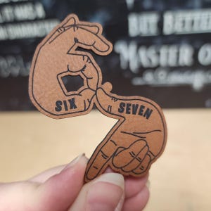 Engraved Six And Seven Hand Sign Hat Patch, Faux Leather