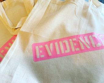 Evidence Bag Tote. Available in Black print or Pink Print. Eco carrier, reusable shopper.