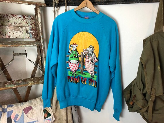 playing the field | vintage humor sweatshirt | cow