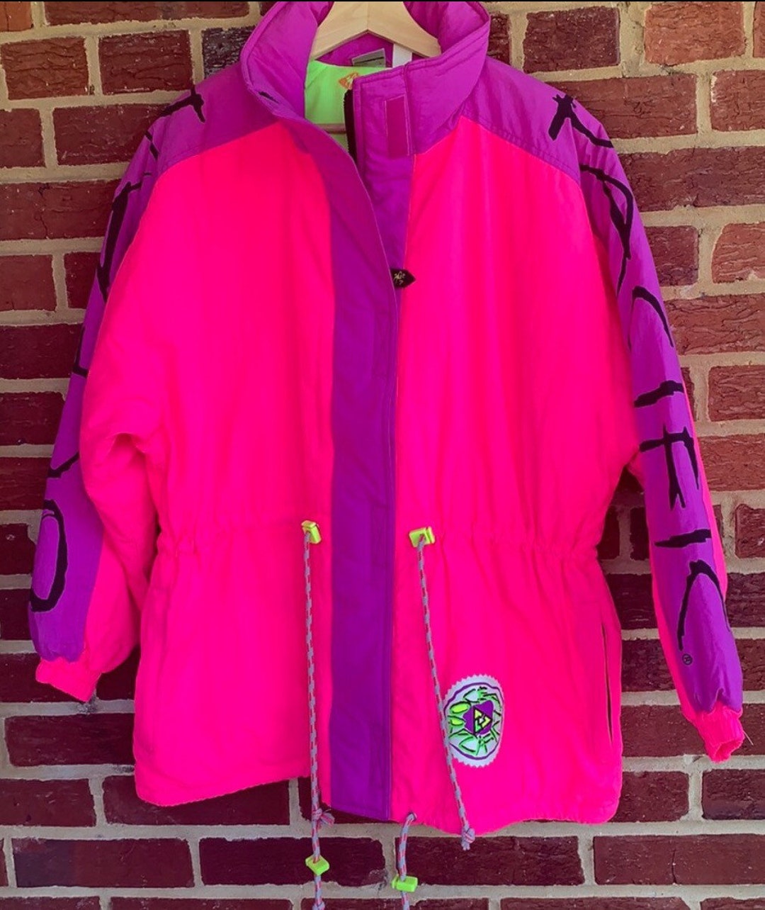 Lime green top pink jacket