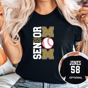 A woman wearing a black t-shirt with a baseball graphic and text that says "SENOR MOM 2026" and "JONES 58".
