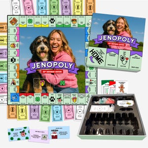 May include: A custom board game titled Jenopoly 30th Birthday Edition featuring a central photograph of a person and a dog. The set includes a game board, a box lid with the same photo, paper money in various denominations, game cards, and a plastic tray.