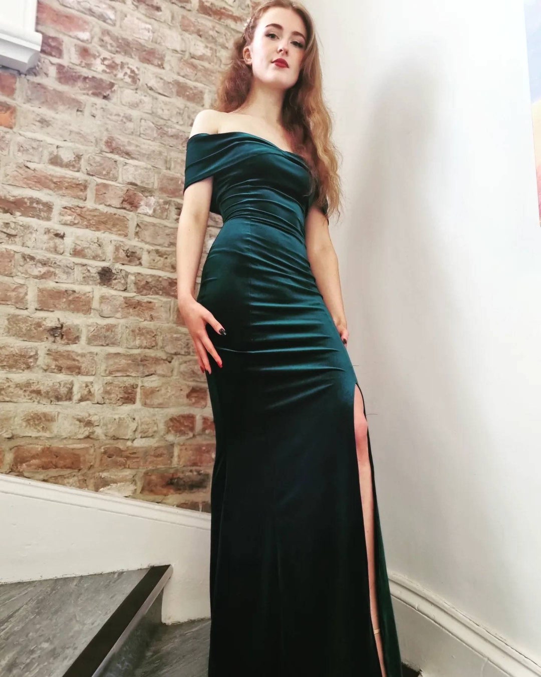 lady black tie emerald green dress