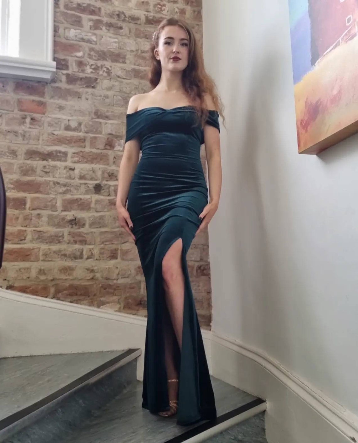 lady black tie emerald green dress