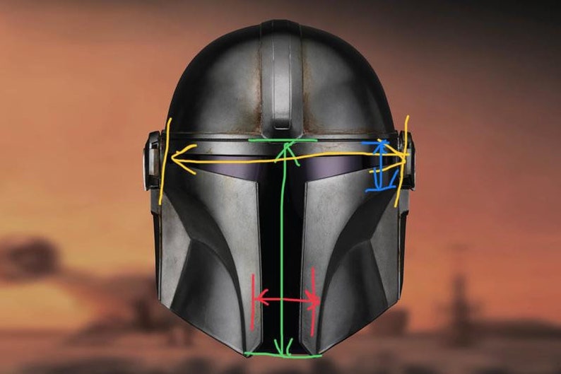 May include: A black and gray helmet with a visor and a textured surface. The helmet has a vertical line down the center and a horizontal line across the top.