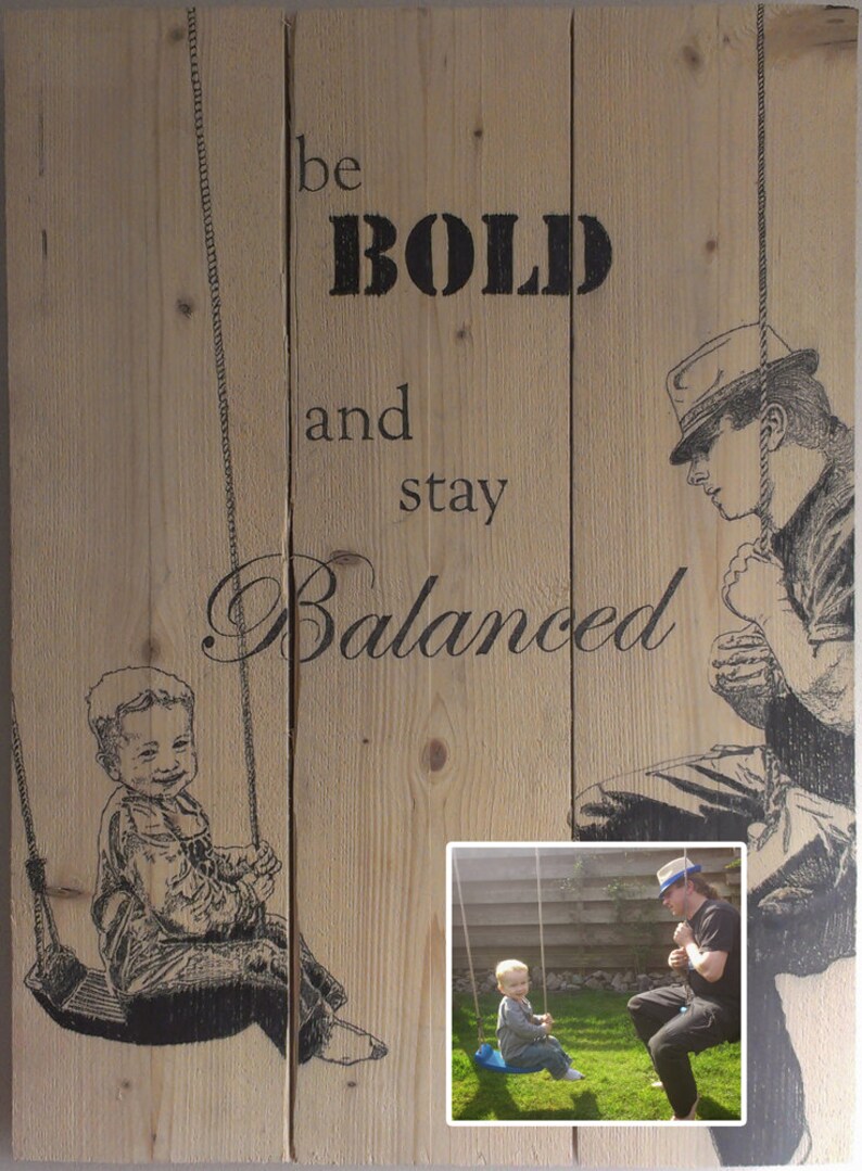 May include: A wooden sign with the text "be BOLD and stay Balanced" printed on it. The sign features two illustrations of people on swings. One illustration is of a man in a hat and the other is of a child.