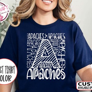 May include: Navy blue t-shirt with a white graphic of the letter 'A' made up of the word 'Apaches' repeated multiple times. The text 'Select T-shirt Color' and 'Custom Available Upon Request' are also visible.