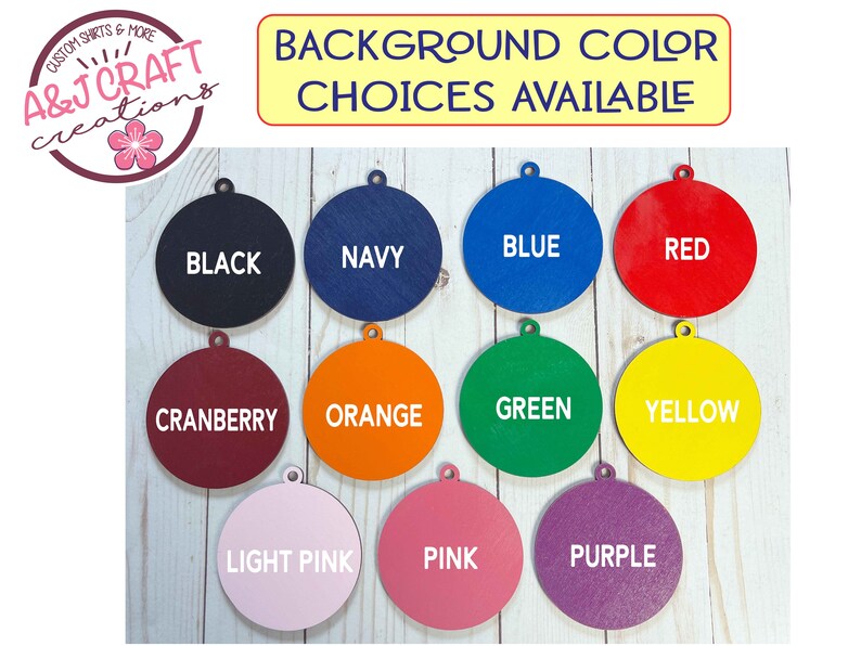 May include: A selection of 12 round wooden circles in various colors, including black, navy, blue, red, cranberry, orange, green, yellow, light pink, pink, and purple. Each circle has a white text label indicating its color.