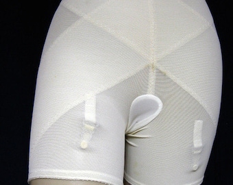 Panty girdle with clearance garters