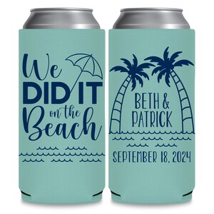 May include: Two blue and white can coolers. The left cooler has the text 'We DID IT on the Beach' with a blue umbrella. The right cooler has two palm trees with the text 'Beth & Patrick' and 'SEPTEMBER 18, 2024'.