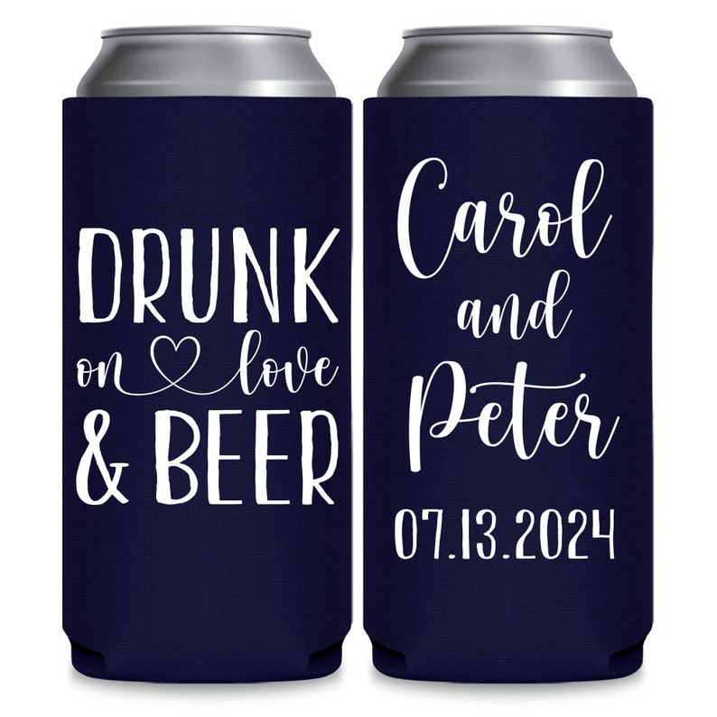 May include: Two navy blue can coolers with white text. The cooler on the left says 'Drunk on love & beer'. The cooler on the right says 'Carol and Peter 07.13.2024'.