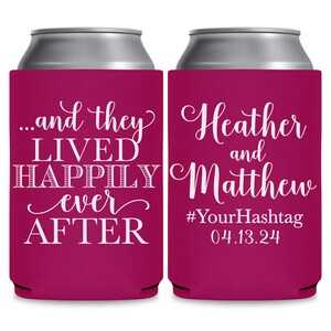 May include: Two pink can coolers with white text. The left cooler says '...and they lived happily ever after'. The right cooler says 'Heather and Matthew #YourHashtag 04.13.24'.