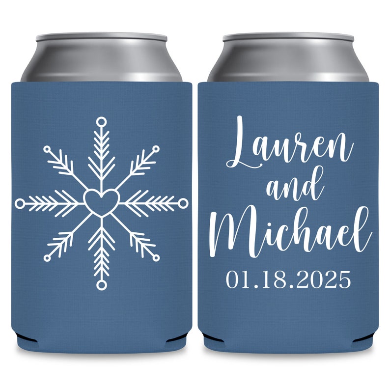May include: Two blue can coolers with white text and designs. The cooler on the left has a snowflake design with a heart in the center. The cooler on the right has the text 'Lauren and Michael 01.18.2025'.