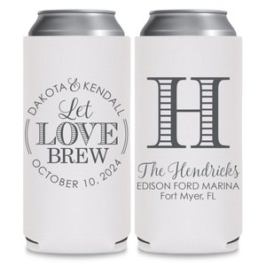 May include: Two white can coolers with a gray design. The left cooler has a circle with the text 'Dakota & Kendall Let Love Brew October 10, 2024'. The right cooler has a large gray letter 'H' and the text 'The Hendricks Edison Ford Marina Fort Myer, FL'.