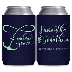 May include: Two navy blue can coolers with a white top. The left cooler has a green anchor and infinity symbol with the text 'anchored forever'. The right cooler has the text 'Samantha & Jonathan' and 'SEPTEMBER 8TH 2023'.