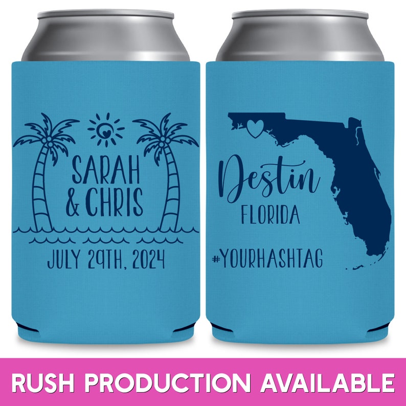 May include: Two blue and white can coolers. The left cooler has a palm tree design with the text 'Sarah & Chris' and 'July 29th, 2024'. The right cooler has a map of Florida with a heart over Destin, Florida. The text 'Destin Florida' and '#YourHashtag' are on the cooler.