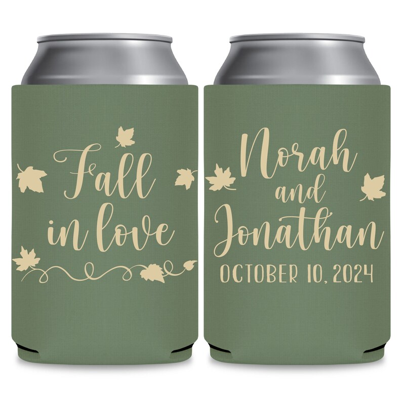 May include: Two green can coolers with a fall wedding theme. The left cooler has the text 'Fall in love' with a vine and leaves design. The right cooler has the text 'Norah and Jonathan' and the date 'OCTOBER 10, 2024'.