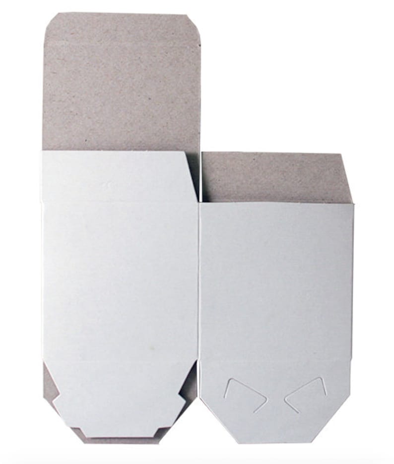May include: Two cardboard boxes, one larger than the other, are shown. The boxes are both white with a brown top flap. The boxes have a fold-over design and are meant to be folded into a box shape.