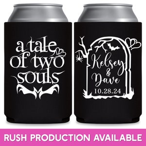 May include: Two black and white Halloween themed wedding can coolers. One cooler has the text 'a tale of two souls' with a bat and heart design. The other cooler has a tombstone with the text 'Kelsey & Dave 10.28.24' with a bat, spider, and heart design.