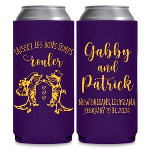 May include: Two purple and gold can coolers. The left cooler has a graphic of two alligators dancing and the text 'LAISSEZ LES BONS TEMPS rouler'. The right cooler has the text 'Gabby and Patrick NEW ORLEANS, LOUISIANA FEBRUARY 19TH, 2024'.