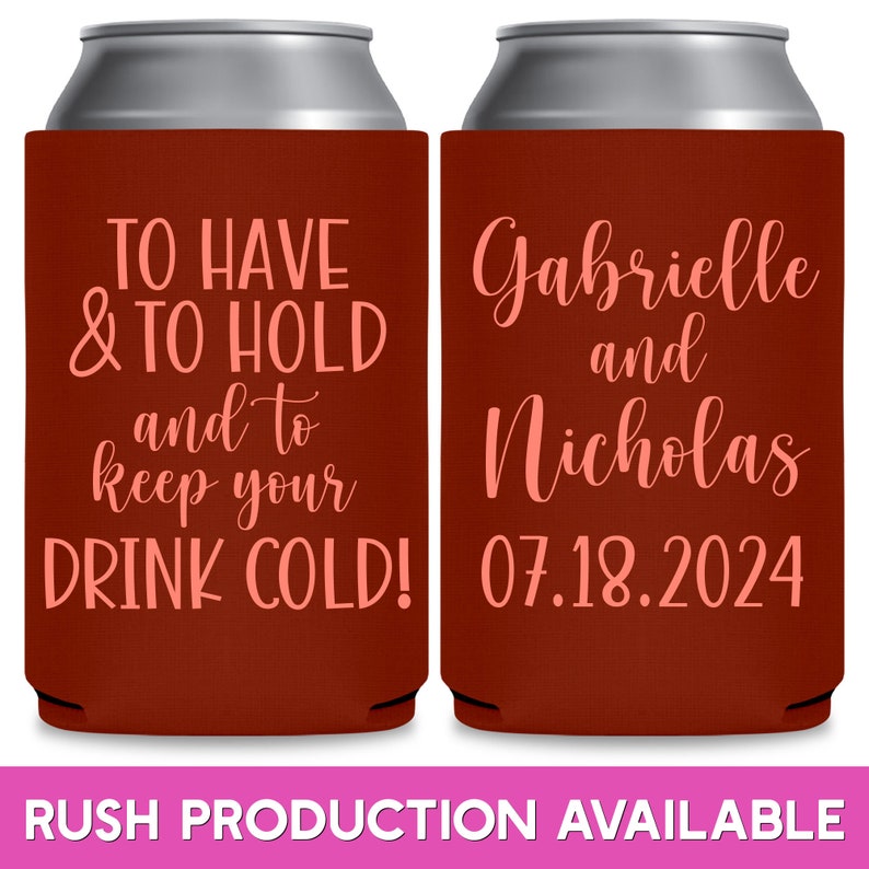 May include: Two red can coolers with white text. The left cooler says 'TO HAVE & TO HOLD and to keep your DRINK COLD!' The right cooler says 'Gabrielle and Nicholas 07.18.2024'.