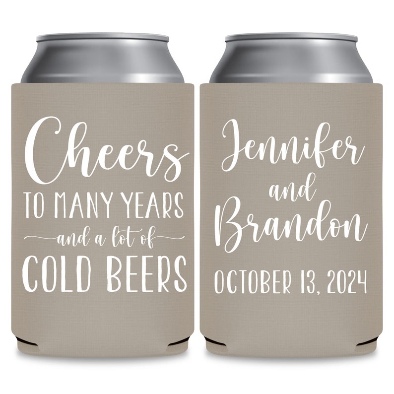 May include: Two tan can coolers with white text. The left cooler says 'Cheers to many years and a lot of cold beers'. The right cooler says 'Jennifer and Brandon October 13, 2024'.