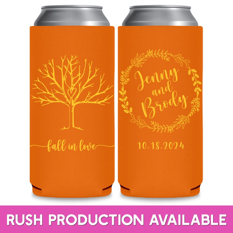 May include: Two orange can coolers with yellow designs. The left cooler has a tree with a heart in the branches and the text 'fall in love'. The right cooler has a wreath with the text 'Jenny and Brody' and the date '10.18.2024'.