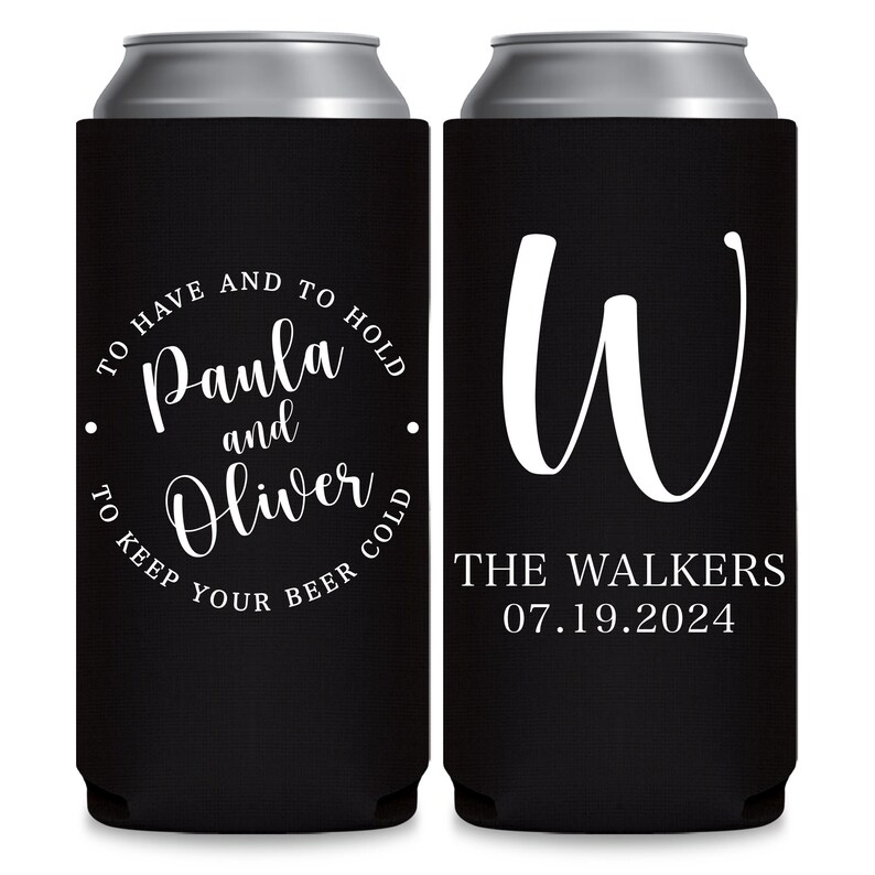 May include: Two black can coolers. The cooler on the left has white text that reads 'To have and to hold Paula and Oliver to keep your beer cold.' The cooler on the right has a white cursive letter 'W' and the text 'The Walkers 07.19.2024'.