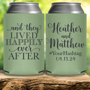 May include: Two green can coolers with white text. The left cooler says '...and they lived happily ever after.' The right cooler says 'Heather and Matthew #YourHashtag 04.13.24'.