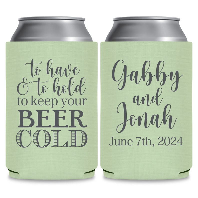 May include: Two green and silver can coolers. The cooler on the left has the text 'to have & to hold to keep your BEER COLD'. The cooler on the right has the text 'Gabby and Jonah June 7th, 2024'.