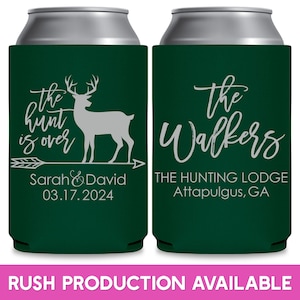 May include: Two green can coolers with white text. The left cooler has a deer silhouette with an arrow and the text 'the hunt is over' and 'Sarah & David 03.17.2024'. The right cooler has the text 'the Walkers THE HUNTING LODGE Attapulgus, GA'.