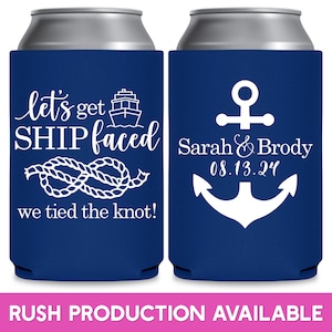May include: Two blue and white can coolers. The left cooler has a white ship, a rope knot, and the text 'let's get SHIP faced we tied the knot!' The right cooler has a white anchor and the text 'Sarah & Brody 08.13.24'.