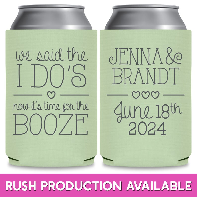 May include: Two green and white can coolers. The left cooler has the text 'we said the I DO'S now it's time for the BOOZE' with a heart symbol. The right cooler has the text 'JENNA & BRANDT June 18th 2024' with three heart symbols.