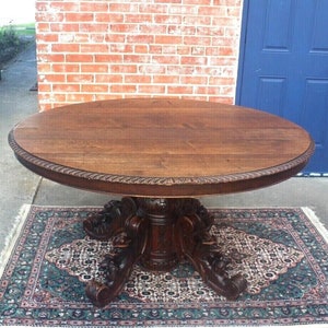 French Antique Oak Renaissance Oval Dining Table With Leaf