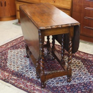 English Antique Jacobean Oak Crusted Edge Drop Leaf Table | Barley Twist Legs