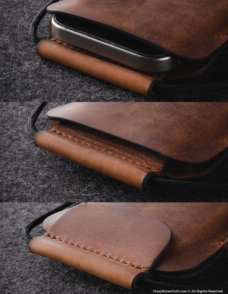 May include: A brown leather phone case with a stitched edge and a black cord. The case is designed to hold a smartphone securely.